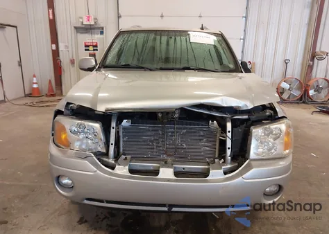2009 GMC Envoy Slt from USA, damaged, VIN 1GKDT43S292131191